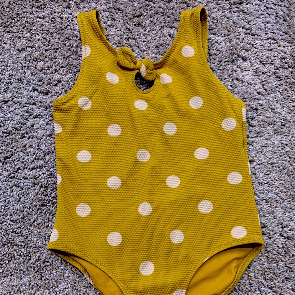 Yellow polka dot one piece. Size 4/5. Great condition. Basically brand new.